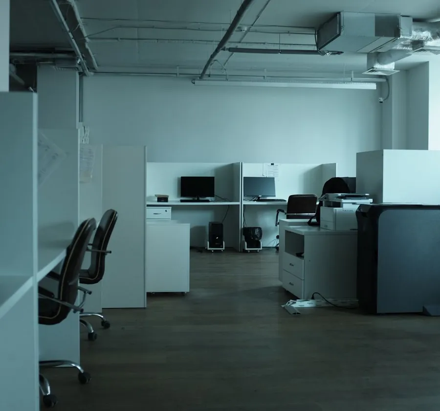 Stock photo: an empty modern open-plan office with workstations