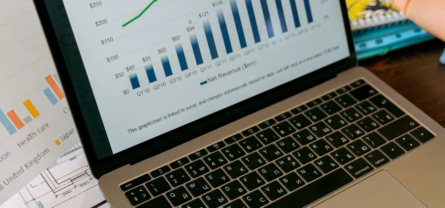Stock photo: a laptop showing business analytics charts